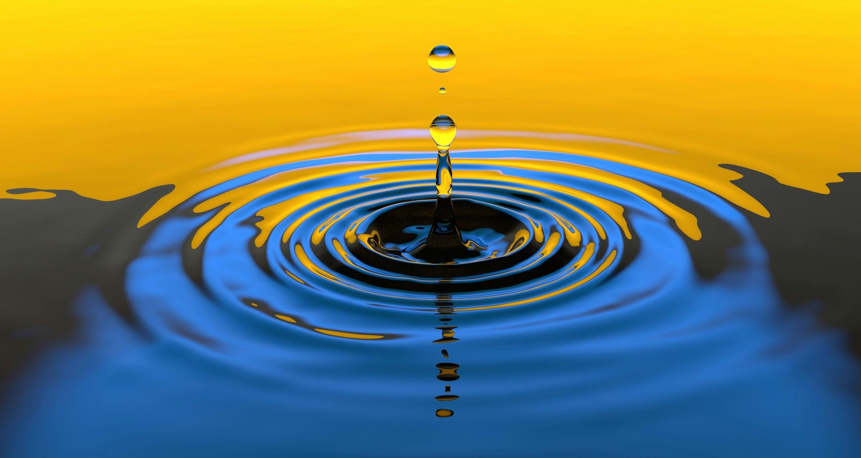 A drop making ripples in water